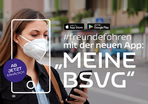 Zu sehen ist eine junge Frau mit Maske, die die neue BSVG-App bedient.